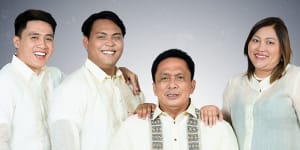 Negros Oriental Governor Roel Degamo,seated with his family,was shot and killed in his own residential compound in Pamplona,Philippines.