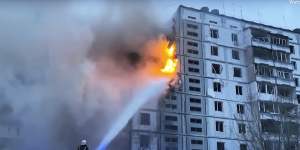 Firefighters work at an apartment building destroyed by a Russian attack in the town of Uman,south of Kyiv on Friday.