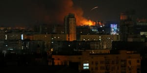 Smoke and flames rise during shelling near Kyiv.