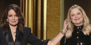 Golden Globes hosts Tina Fey and Amy Poehler in a slightly stretchy two-city link.