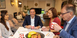 Matthew Guy,wife Renae and opposition energy spokesman David Southwick at a media event on Monday to talk about power prices.
