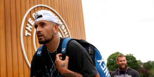 Australian tennis star Nick Kyrgios,seen here after a practice session last Wednesday,has pulled out of Wimbledon after tearing a ligament in his wrist.