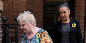 Joanne Dunn (left),the mother of Michaela Dunn,leaves the Supreme Court after hearing Mert Ney give evidence on Tuesday. 