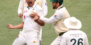 Steamrolled:Pakistan’s Mir Hamza celebrates the Travis Head wicket.