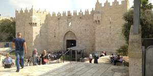 The Damascus Gate entrance to Jerusalem’s Old City. The grey metal structure to the right of the entrance is an Israeli police post. 