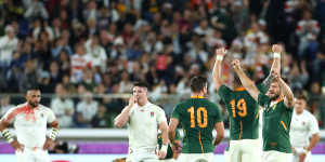 Handre Pollard and Frans Steyn celebrate after the final whistle blows.