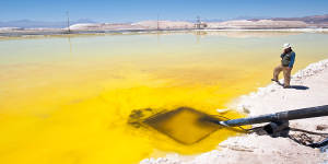 Evaporation ponds in the Atacama Desert,Chile. The sun evaporates the water,leaving lithium chloride.