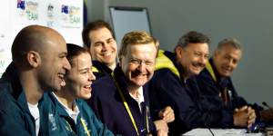 Australian Olympic weightlifters (left) Damian Brown and Michelle Kettner with John Coates,Craig McLatchey,John Bertrand and Peter Brock at the Sydney Olympic Games village in September 2000.