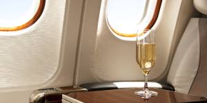 Companies are baulking at paying for staff to travel in business class after prices surged 45 per cent.