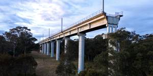 The incomplete Maldon to Dombarton rail bridge. The approach spans begin to lean out towards the edge of the Nepean river gorge only to stop looking out at the other approach spans on the other side. Near Picton Photo Nick Moir 25 august 2022