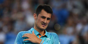 Tomic denies threatening Hewitt