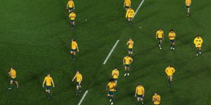 The Wallabies walk off the field after yet another defeat against the All Blacks,in the 2011 World Cup.