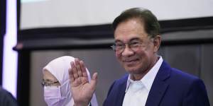 Opposition Leader Anwar claims'formidable'majority to govern