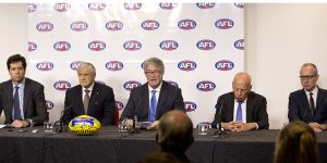 AFL chief executive Gillon McLachlan with (left to right) Kerry Stokes,AFL chairman Mike Fitzpatrick,and Rupert Murdoch as they announce the record-breaking deal.