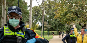 A man wearing a mask of Victorian Premier Daniel Andrews at an anti-lockdown protest in September.