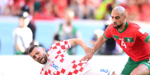 Mateo Kovacic of Croatia and Sofyan Amrabat of Morocco battle for the ball.