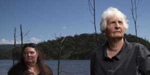 Traditional owners Aunty Sharyn Halls (right) with Kazan Brown stand beside Lake Burragorang in Sydney's Special Areas. Lake levels will rise as much as 17 metres if the height of the Warragamba Dam wall is raised,consigning hundreds of Indigenous sites to destruction during a big rain event.