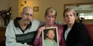 Joy Van Duinen holds a photo of her son Gary,who took his own life after a 13-hour gambling binge. 