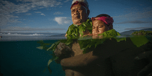 Kioa island resident Lotomau Fiafia and his grandson John.