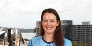 Sydney FC captain Natalie Tobin with the A-League Women’s grand final trophy.