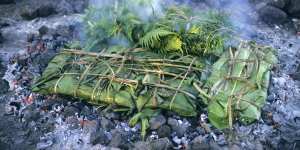 Laplap wrapped with bananas leaves and cooked on coals,Tanna,Vanuatu.