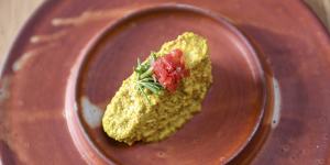 Kingfish in turmeric,mustard and coconut sauce with sea succulents and blood lime.