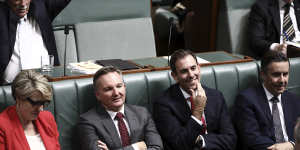 Labor finance spokesman Jim Chalmers (second from right) with Labor frontbenchers on Wednesday.