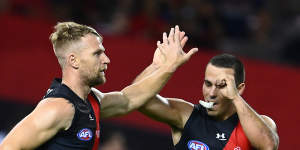 Jake Stringer is congratulated by Alec Waterman after scoring for the Bombers.