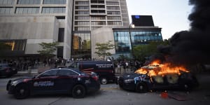 An Atlanta Police Department vehicle burns during a demonstration against police violence on May 29. 