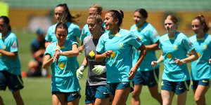 Mary Fowlers shares a laugh with teammates during training in Perth.