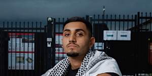 Former Condell Park High School student Jad Salamah has reached a confidential settlement with the Department of Education after being banned from his school formal for wearing a keffiyeh-patterned scarf to his graduation.