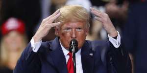 A visibly rattled US President Donald Trump raved and ranted at a rally in Battle Creek,Michigan,while the impeachment vote was taking place.