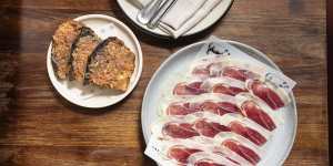 Go-to dish:Jamon Iberico with pan Catalan (grilled bread rubbed with garlic and tomato,left). 