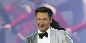 Hugh Jackman performs onstage at the Brit Awards.