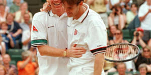 The Australian doubles team of Mark Woodforde and Todd Woodbridge celebrate after beating Paul Haarhuis and Jacco Eltingh of the Netherlands.