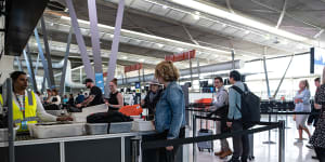 Security screening at the domestic terminal in Sydney Airport.