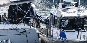 Water police remove two bodies from the yacht “Taloha” near Folly Point at Cammeray.