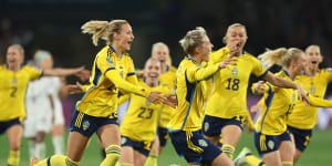 Lina Hurtig and team Sweden celebrate after defeating the USA in penalty shootout.