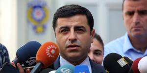 Pro-Kurdish Peoples Democracy Party leader Selahattin Demirtas speaks to the media about Turkey's air strikes against Kurdish rebel bases in Iraq on Monday.