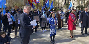 Rahima Mahmut from the World Uighur Congress with Conservative MPs Nus Ghani and Sir Iain Duncan Smith in London address a gathering before the genocide vote.