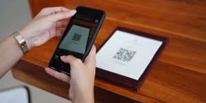 QR codes turn analog interactions into digital ones,stirring privacy fears