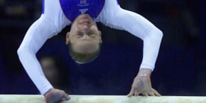 Great Britain's Annika Reeder crashes on the vault,which had been set 5cm too low. 