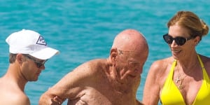 Rupert Murdoch enjoys the Barbados sun in the company of Ann-Lesley Smith.