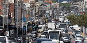 Trams are brought to a standstill in the bottleneck of Sydney Road.