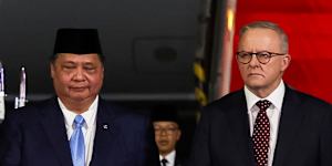 The prime minister arrives in Indonesia.