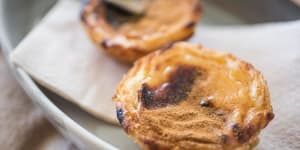 CInnamon and sugar crusted custard tarts.