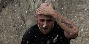 A swimmer heads for cover as hail hits Bondi during a severe storm.