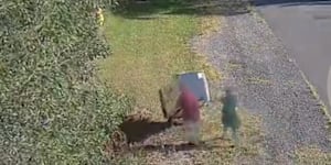 CCTV images of a couple allegedly dumping a fridge in Brisbane. 