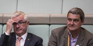 Gay rights campaigner Rodney Croome (right) in parliament in 2017 with MP Andrew Wilkie.