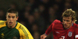 Harry Kewell goes past David Beckham in the famous friendly match between Australia and England at Upton Park in 2003.